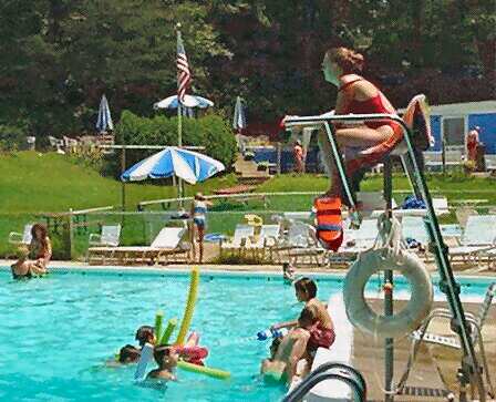 Lifeguard and kids having fun in the pool